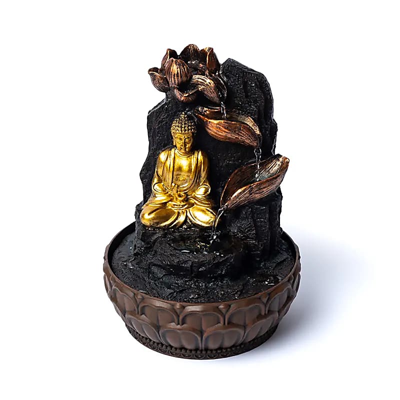 Meditating buddha with lotus water fountain