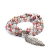 Mala Rodonite/Quarzo grigio + piuma