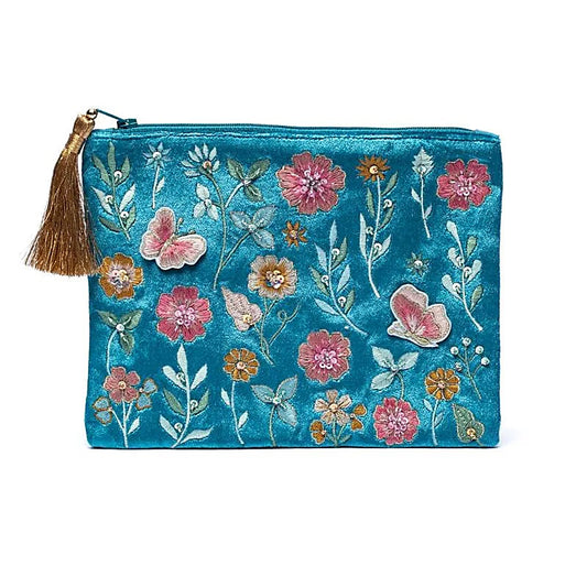 Bolsa de terciopelo azul con cremallera y flores