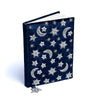 Cuaderno de terciopelo azul oscuro con sol y luna