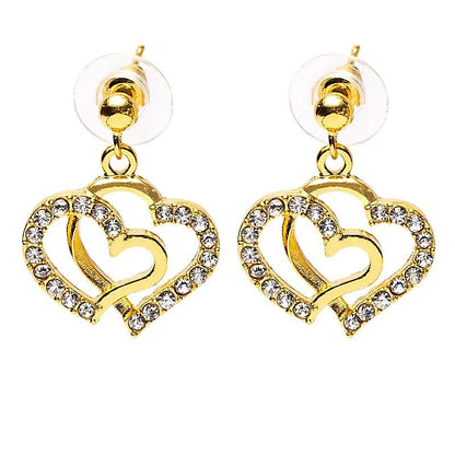 Boucles d'oreilles cœurs dorées thumb