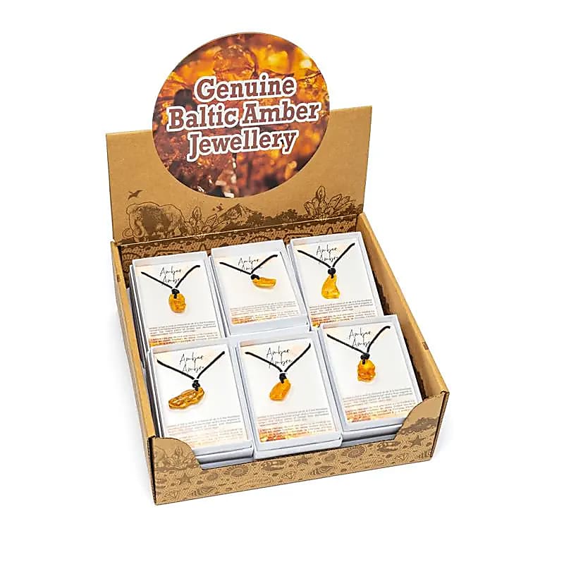 Pendentifs en ambre 12 pièces dans une boîte présentoir